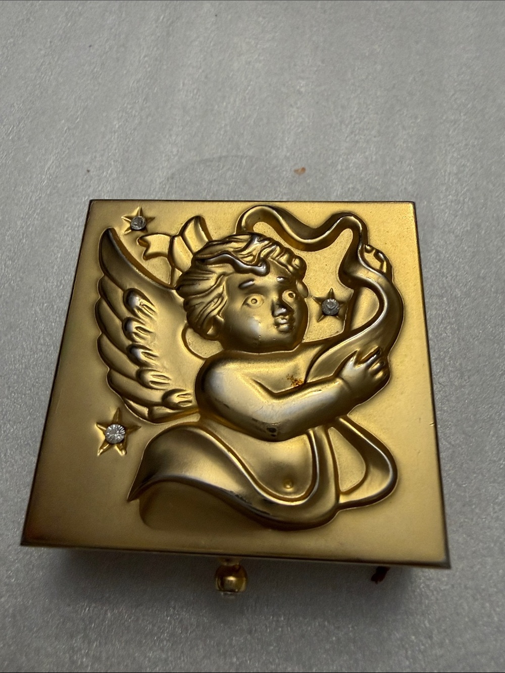 Gold tone metal cherub angel/small pill case